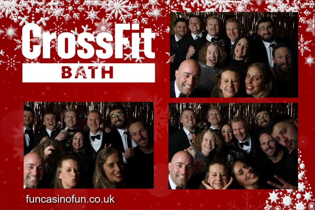 Guests enjoying the photo booth at a winter party