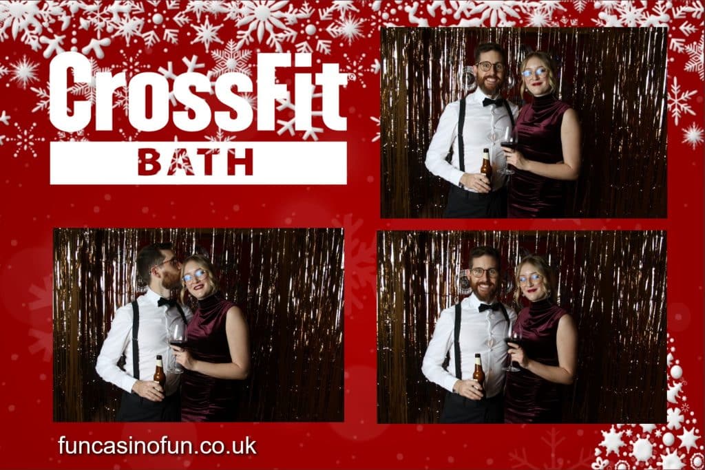 Guests smiling for the camera at a festive photo booth party